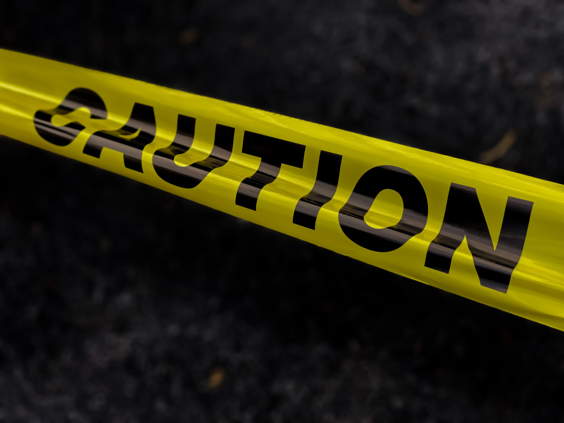 Yellow caution tape marking an accident scene